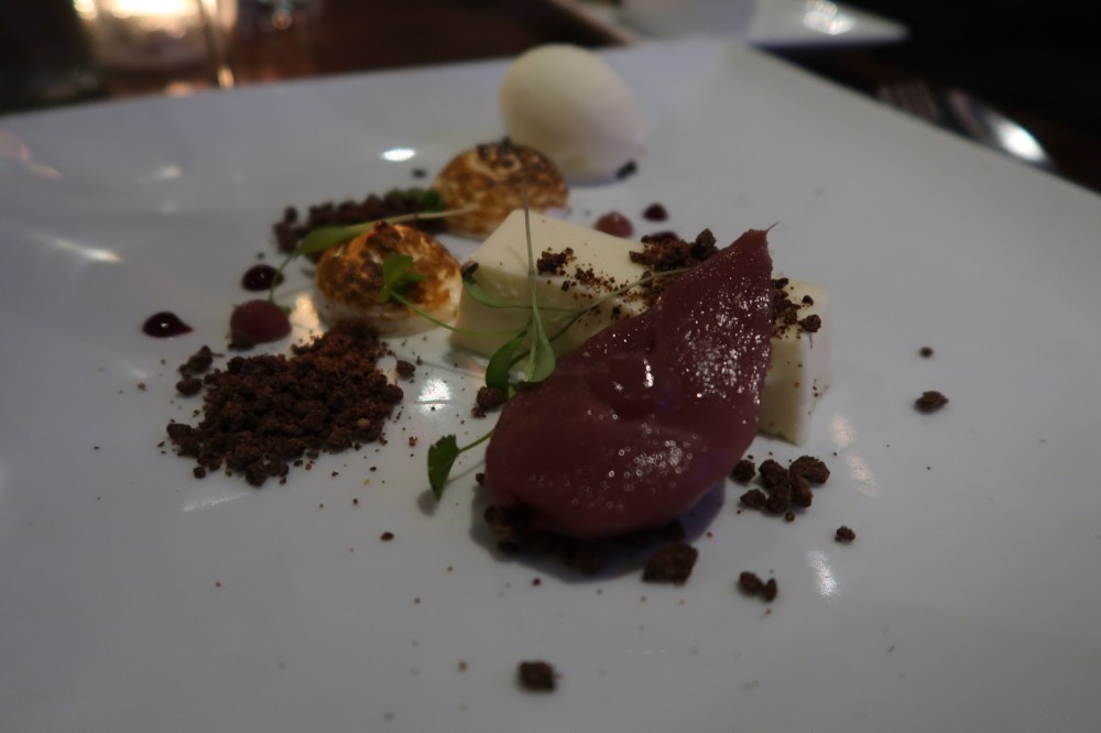 Spiced poached pear, vanilla panna cotta, Italian meringue